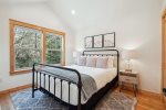 Upstairs Second Bedroom with Queen Bed at Driftwood Cottage